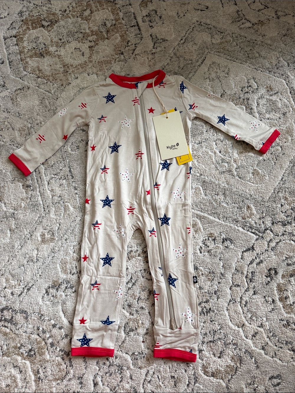 Kyte BABY Cream One-Piece Footie with Red Trim and Navy Stars—NWT